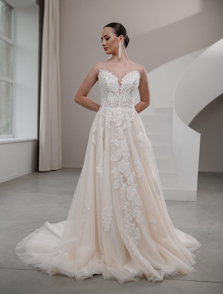 Brautkleid aus Tüll mit einem Oberteil aus zarter Spitze