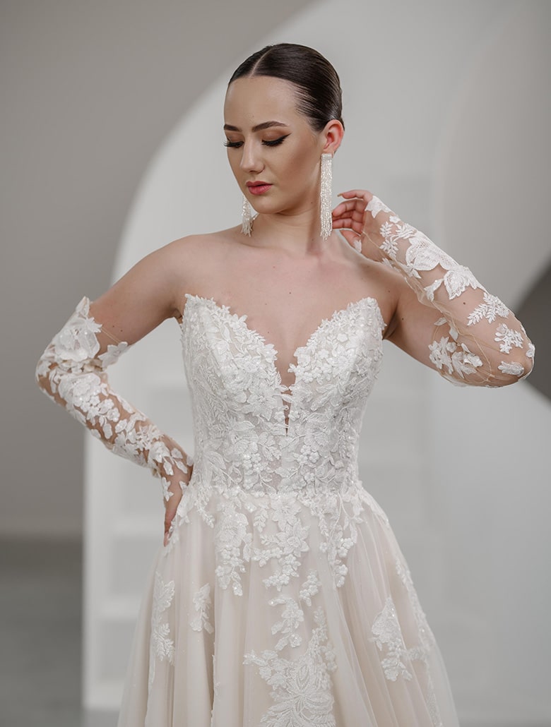 Brautkleid aus Tüll mit einem Oberteil aus zarter Spitze